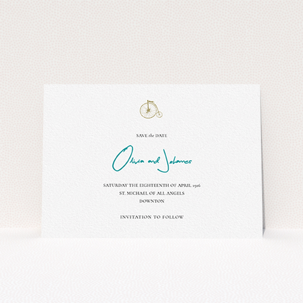 A wedding save the date card named "On your bike new". It is an A6 card in a landscape orientation. "On your bike new" is available as a flat card, with tones of white and blue.