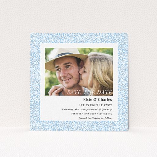 Wedding Save The Date Card - Pastel Flower Border (Light Blue) A wedding save the date card design named "Pastel flower border". It is a square (148mm x 148mm) card in a square orientation. It is a photographic wedding save the date card with room for 1 photo. "Pastel flower border" is available as a flat card, with tones of blue and white.