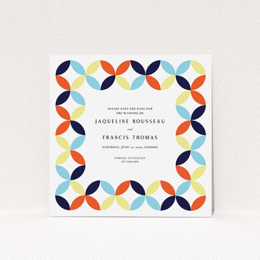 Wedding Save The Date Card Design - "Round and Round" A wedding save the date card design titled "Round and Round". It is a square (148mm x 148mm) card in a square orientation. "Round and Round" is available as a flat card, with mainly light blue colouring.