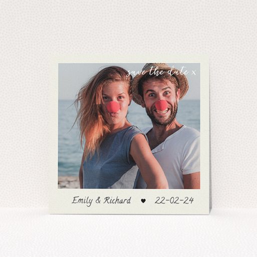 Wedding Save The Date Card Design - "Save the Date by Hand" A wedding save the date card called "Save the Date by Hand". It is a square (148mm x 148mm) card in a square orientation. It is a photographic wedding save the date card with room for 1 photo. "Save the Date by Hand" is available as a flat card, with tones of cream and navy blue.