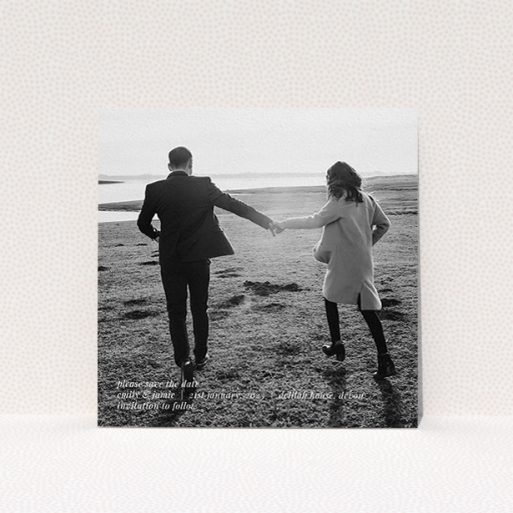 Wedding Save The Date Card Design - "Tradition with Photo" A wedding save the date card design titled "Tradition with Photo". It is a square (148mm x 148mm) card in a square orientation. It is a photographic wedding save the date card with room for 1 photo. "Tradition with Photo" is available as a flat card, with mainly white colouring.