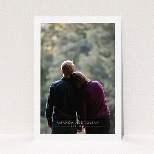 Wedding Save The Date Card Design - "Tramlines" A wedding save the date card called "Tramlines". It is an A5 card in a portrait orientation. It is a photographic wedding save the date card with room for 1 photo. "Tramlines" is available as a flat card, with mainly white colouring.