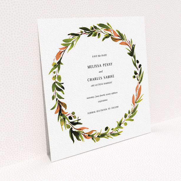 A wedding save the date card called "Watercolour Olive Wreath". It is a square (148mm x 148mm) card in a square orientation. "Watercolour Olive Wreath" is available as a flat card, with tones of green, dark green and terracotta.