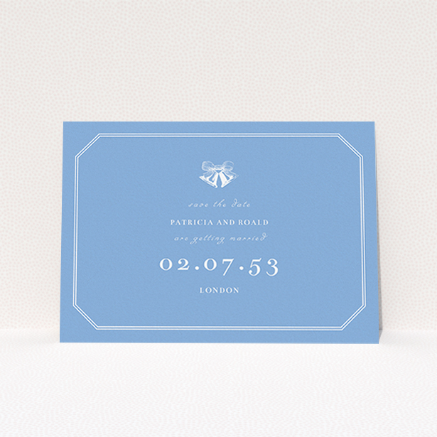 A wedding save the date card named "Wedding bells". It is an A6 card in a landscape orientation. "Wedding bells" is available as a flat card, with tones of blue and white.