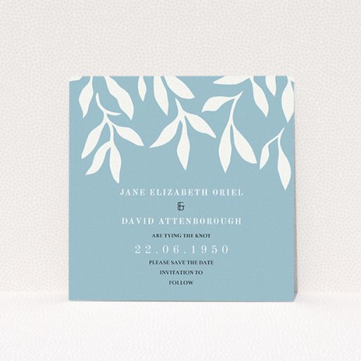 Wedding Save The Date Card Design - "Winter bloom" A wedding save the date card named "Winter bloom". It is a square (148mm x 148mm) card in a square orientation. "Winter bloom" is available as a flat card, with tones of blue and white.