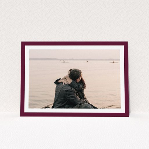Wedding Save The Date Design - "Classic Burgundy Photo Frame" A wedding save the date design named "Classic Burgundy Photo Frame". It is an A5 save the date in a landscape orientation. It is a photographic wedding save the date with room for 1 photo. "Classic Burgundy Photo Frame" is available as a flat save the date, with tones of burgundy and white.