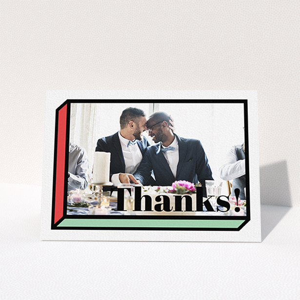 A wedding thank you card called "3D Thank You". It is an A6 card in a landscape orientation. It is a photographic wedding thank you card with room for 1 photo. "3D Thank You" is available as a folded card, with tones of red, green and black.