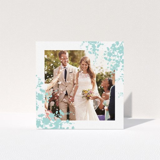 Wedding Thank You Card Design - "Blue blossom" A wedding thank you card design named "Blue blossom". It is a square (148mm x 148mm) card in a square orientation. It is a photographic wedding thank you card with room for 1 photo. "Blue blossom" is available as a folded card, with tones of blue and white.