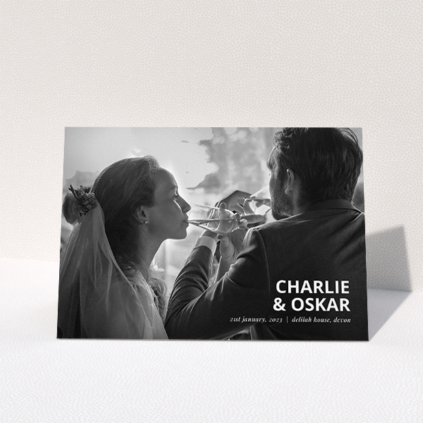 A wedding thank you card design named "Bold Photo Corner". It is an A5 card in a landscape orientation. It is a photographic wedding thank you card with room for 1 photo. "Bold Photo Corner" is available as a folded card, with mainly white colouring.