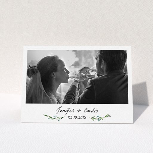 Wedding Thank You Card Design - "Classic Floral" A wedding thank you card named "Classic Floral". It is an A5 card in a landscape orientation. It is a photographic wedding thank you card with room for 1 photo. "Classic Floral" is available as a folded card, with tones of green and white.