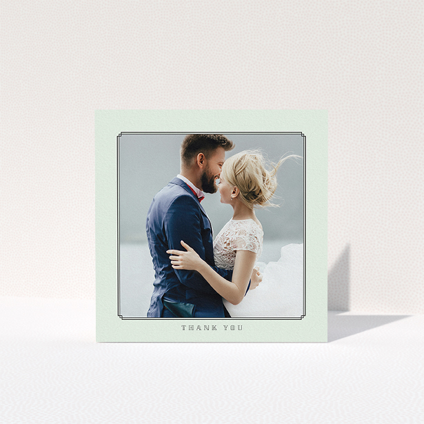 A wedding thank you card design called "Deco mint". It is a square (148mm x 148mm) card in a square orientation. It is a photographic wedding thank you card with room for 1 photo. "Deco mint" is available as a folded card, with mainly green colouring.