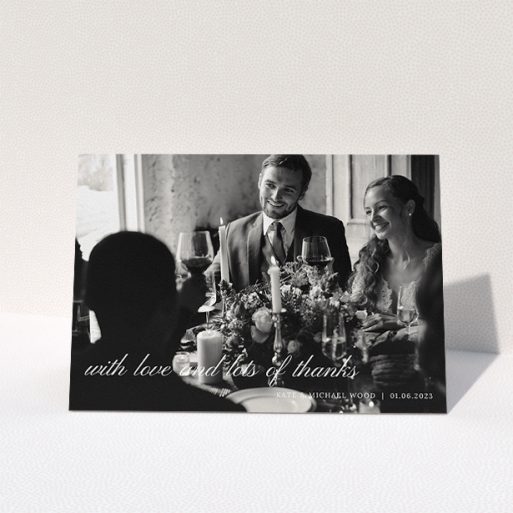 Wedding Thank You Card Design - "Elegant Photo Thanks" A wedding thank you card called "Elegant Photo Thanks". It is an A5 card in a landscape orientation. It is a photographic wedding thank you card with room for 1 photo. "Elegant Photo Thanks" is available as a folded card, with mainly white colouring.
