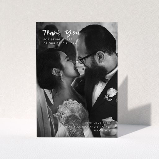 Wedding Thank You Card Design - "Front Cover" A wedding thank you card design named "Front Cover". It is an A5 card in a portrait orientation. It is a photographic wedding thank you card with room for 1 photo. "Front Cover" is available as a folded card, with mainly white colouring.