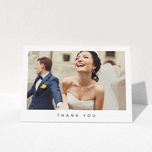 A wedding thank you card design titled "Full-page landscape". It is an A5 card in a landscape orientation. It is a photographic wedding thank you card with room for 1 photo. "Full-page landscape" is available as a folded card, with mainly white colouring.