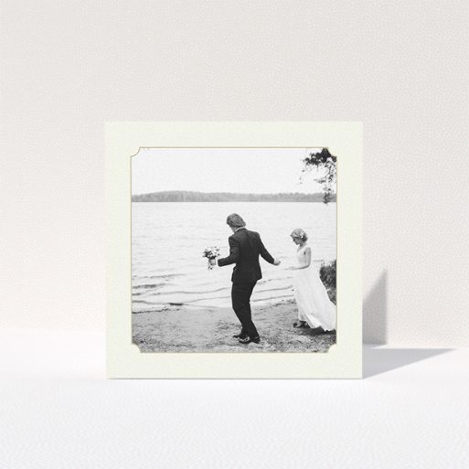 Wedding Thank You Card Design - "Gold & Cream Notch Frame" A wedding thank you card design titled "Gold & Cream Notch Frame". It is a square (148mm x 148mm) card in a square orientation. It is a photographic wedding thank you card with room for 1 photo. "Gold & Cream Notch Frame" is available as a folded card, with mainly cream colouring.