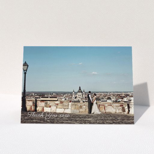 Wedding Thank You Card Design - "Italianno" A wedding thank you card named "Italianno". It is an A5 card in a landscape orientation. It is a photographic wedding thank you card with room for 1 photo. "Italianno" is available as a folded card, with mainly white colouring.