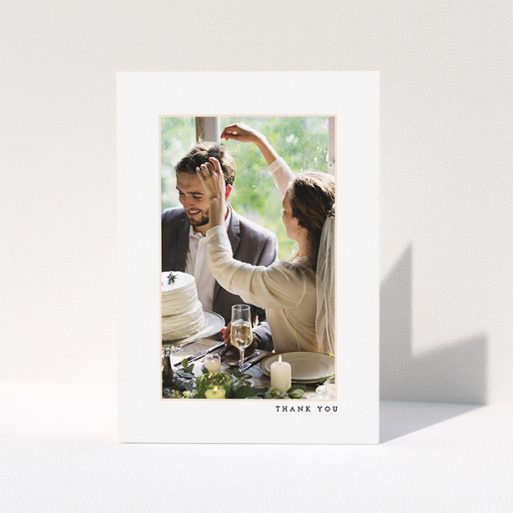 Wedding Thank You Card Design - "Little pink border" A wedding thank you card template titled "Little pink border". It is an A5 card in a portrait orientation. It is a photographic wedding thank you card with room for 1 photo. "Little pink border" is available as a folded card, with mainly white colouring.