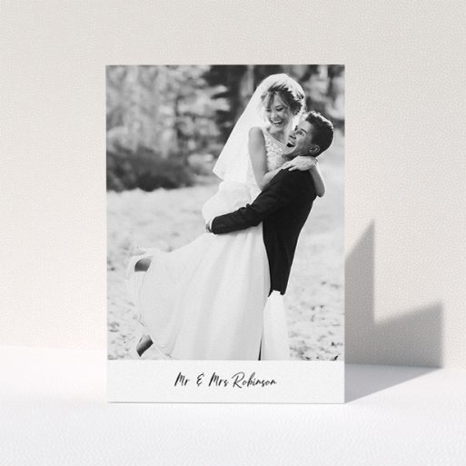Wedding Thank You Card Design - "Mr & Mrs Footer" A wedding thank you card design titled "Mr & Mrs Footer". It is an A5 card in a portrait orientation. It is a photographic wedding thank you card with room for 1 photo. "Mr & Mrs Footer" is available as a folded card, with mainly white colouring.