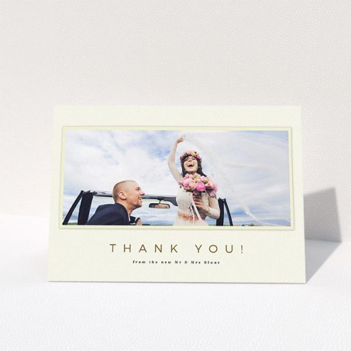 Wedding Thank You Card Design - "One white Polaroid " A wedding thank you card called "One white Polaroid ". It is an A5 card in a landscape orientation. It is a photographic wedding thank you card with room for 1 photo. "One white Polaroid " is available as a folded card, with mainly cream colouring.