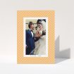 A wedding thank you card design called "Orange Houndstooth". It is an A6 card in a portrait orientation. It is a photographic wedding thank you card with room for 1 photo. "Orange Houndstooth" is available as a folded card, with tones of orange and white.