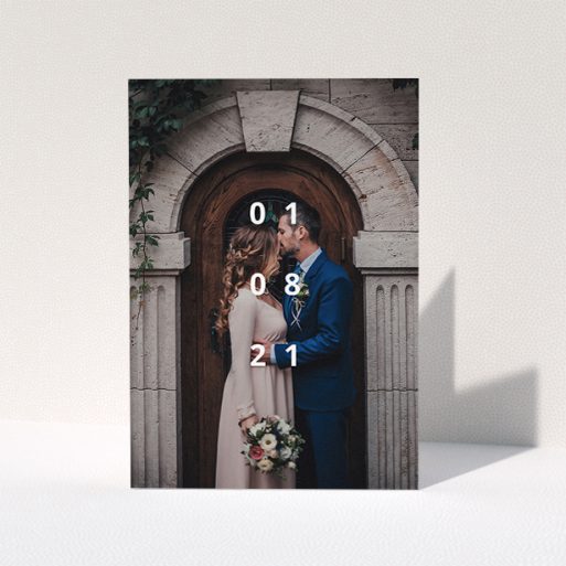 Wedding Thank You Card Design - "Our Date" A wedding thank you card called "Our Date". It is an A5 card in a portrait orientation. It is a photographic wedding thank you card with room for 1 photo. "Our Date" is available as a folded card, with mainly white colouring.