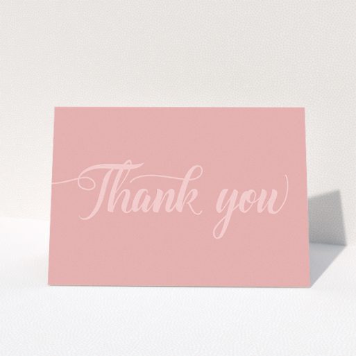 Wedding Thank You Card Design - "Pastel pink calligraphy" A wedding thank you card design called "Pastel pink calligraphy". It is an A5 card in a landscape orientation. "Pastel pink calligraphy" is available as a folded card, with mainly pink colouring.