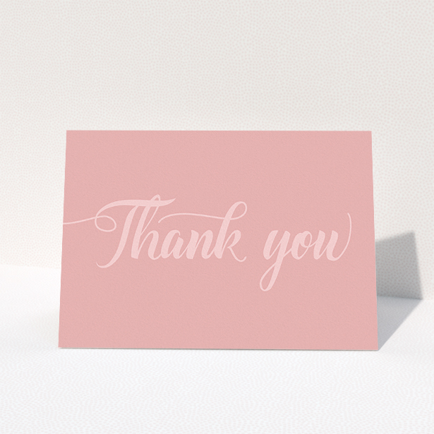 A wedding thank you card design called "Pastel pink calligraphy". It is an A5 card in a landscape orientation. "Pastel pink calligraphy" is available as a folded card, with mainly pink colouring.