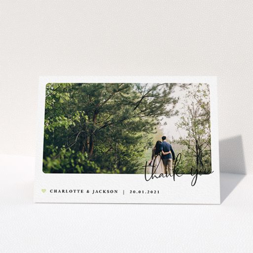 Wedding Thank You Card Design - "Rounded-Off with Thanks" A wedding thank you card design called "Rounded-Off with Thanks". It is an A6 card in a landscape orientation. It is a photographic wedding thank you card with room for 1 photo. "Rounded-Off with Thanks" is available as a folded card, with mainly white colouring.