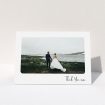 A wedding thank you card design called "Rounded Thanks". It is an A5 card in a landscape orientation. It is a photographic wedding thank you card with room for 1 photo. "Rounded Thanks" is available as a folded card, with mainly white colouring.