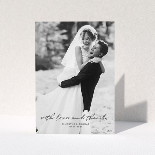Wedding Thank You Card Design - "Script & Serif" A wedding thank you card design named "Script & Serif". It is an A5 card in a portrait orientation. It is a photographic wedding thank you card with room for 1 photo. "Script & Serif" is available as a folded card, with mainly black colouring.