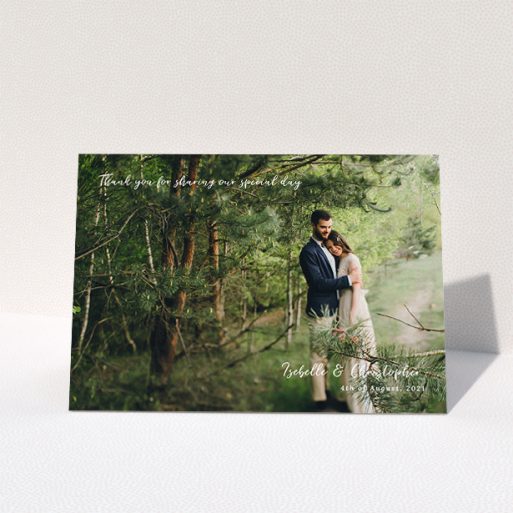 Wedding Thank You Card Design - "Scripted" A wedding thank you card design named "Scripted". It is an A5 card in a landscape orientation. It is a photographic wedding thank you card with room for 1 photo. "Scripted" is available as a folded card, with mainly white colouring.