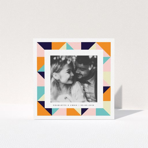 Wedding Thank You Card Design - "Sloane Squares" A wedding thank you card named "Sloane Squares". It is a square (148mm x 148mm) card in a square orientation. It is a photographic wedding thank you card with room for 1 photo. "Sloane Squares" is available as a folded card, with tones of pink, orange and navy blue.