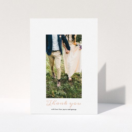 Wedding Thank You Card Design - "Small and Central" A wedding thank you card called "Small and Central". It is an A5 card in a portrait orientation. It is a photographic wedding thank you card with room for 1 photo. "Small and Central" is available as a folded card, with tones of white and pink.