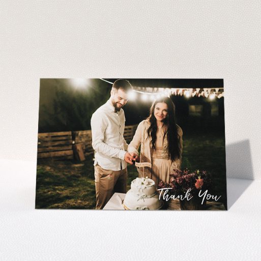 Wedding Thank You Card Design - "Thanks From The Corner" A wedding thank you card named "Thanks From The Corner". It is an A5 card in a landscape orientation. It is a photographic wedding thank you card with room for 1 photo. "Thanks From The Corner" is available as a folded card, with mainly white colouring.