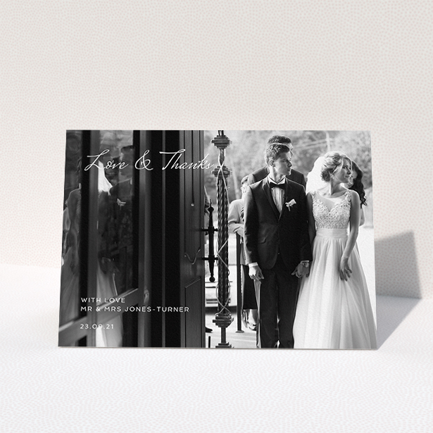 A wedding thank you card template titled "To the Left Photo". It is an A5 card in a landscape orientation. It is a photographic wedding thank you card with room for 1 photo. "To the Left Photo" is available as a folded card, with mainly white colouring.