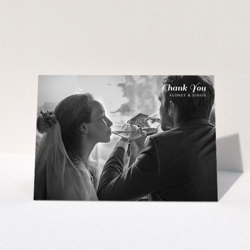 Wedding Thank You Card Design - "Top-Right" A wedding thank you card design titled "Top-Right". It is an A5 card in a landscape orientation. It is a photographic wedding thank you card with room for 1 photo. "Top-Right" is available as a folded card, with mainly white colouring.
