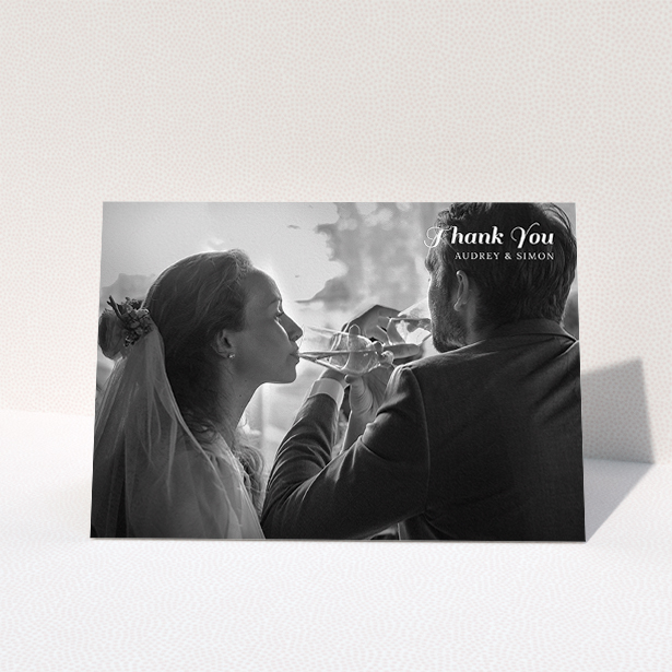 A wedding thank you card design titled "Top-Right". It is an A5 card in a landscape orientation. It is a photographic wedding thank you card with room for 1 photo. "Top-Right" is available as a folded card, with mainly white colouring.