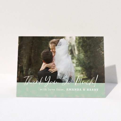 Wedding Thank You Card Design - "Woodland Footer" A wedding thank you card design called "Woodland Footer". It is an A5 card in a landscape orientation. It is a photographic wedding thank you card with room for 1 photo. "Woodland Footer" is available as a folded card, with tones of green and white.