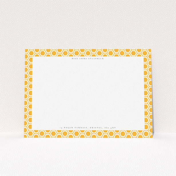 A womens correspondence card design titled "The honeycomb". It is an A5 card in a landscape orientation. "The honeycomb" is available as a flat card, with tones of orange and white.