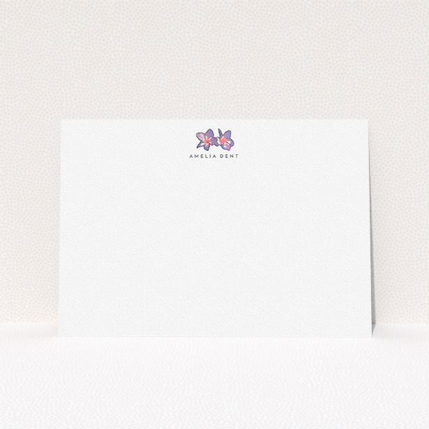 A womens correspondence card called "Two little flowers". It is an A5 card in a landscape orientation. "Two little flowers" is available as a flat card, with tones of white and purple.